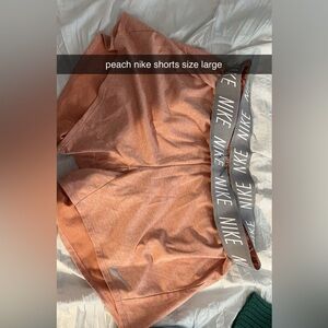 peach nike shorts